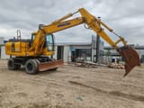 2007 Komatsu PW140-7 wheel excavator side view