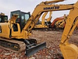 Komatsu PC56 mini excavator, side view