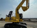 2024 Komatsu PC220 LC crawler excavator, side view