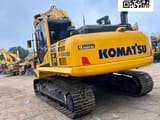 2024 Komatsu PC210 LC crawler excavator, rear three-quarter view