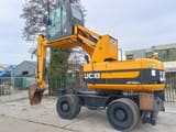 2011 JCB JS160W material handler, side view