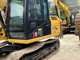 2023 Caterpillar 313GC crawler excavator, side view