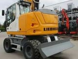 2023 Liebherr A 913 Compact wheel excavator, rear three-quarter view