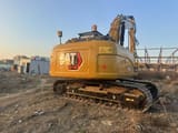 Caterpillar 315D2 crawler excavator, rear three-quarter view