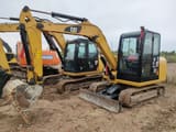 2024 Caterpillar 305.5 mini excavator, side view