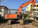 2022 Hitachi Zaxis 210 excavator, side view