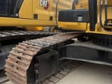 2024 Caterpillar 336D crawler excavator side view of tracks and cab