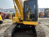 2014 Komatsu PC120-8 crawler excavator, front view of cab and boom