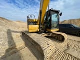 2022 Caterpillar 320 crawler excavator, side view