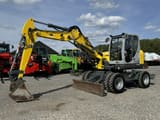 2016 Wacker Neuson EW100 wheel excavator, side view