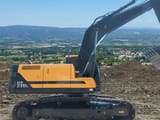 2024 Hyundai HX210L crawler excavator, side view