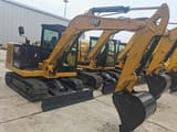 2023 Caterpillar 305.5E2 mini excavator, side view