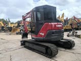 2025 Yanmar VIO85 mini excavator, rear three-quarter view