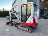 2021 Takeuchi TB216 mini excavator, three-quarter view