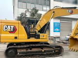 2022 Caterpillar 320GC crawler excavator side view