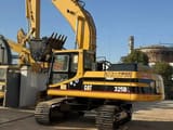 1996 Caterpillar 325BL crawler excavator, side view