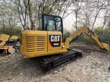 2022 Caterpillar 306E2 mini excavator, rear three-quarter view