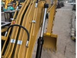 2022 Caterpillar 320GX crawler excavator boom and bucket detail