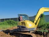 2022 Yanmar VIO75 mini excavator, rear three-quarter view