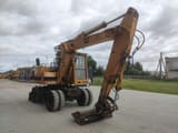 1992 Caterpillar 214 B wheel excavator, front three-quarter view
