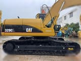 Гусеничний екскаватор 2010 Caterpillar 320CL, боковий вигляд