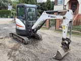 2015 Bobcat E25EM mini excavator, front three-quarter view