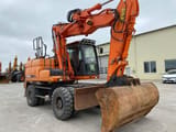 2016 Doosan DX160 wheel excavator, front three-quarter view