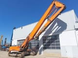 2012 Doosan DX420LC demolition excavator, side view