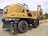 2022 Caterpillar MH3040-07A material handler rear three-quarter view