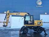 2012 Caterpillar M313D wheel excavator, side profile view