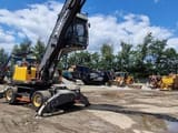 2018 Volvo EW240EMH material handler, side view