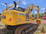 2023 Komatsu PC200 crawler excavator rear three-quarter view