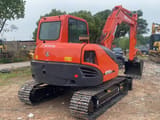 2023 Kubota KX185 mini excavator, rear three-quarter view