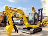Komatsu PC55MR-2 mini excavator, front three-quarter view