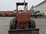 1995 Ditch Witch 7610DD wheel excavator, rear view with blade