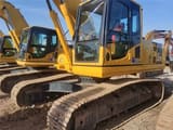 Komatsu PC220 crawler excavator, front three-quarter view