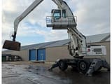 2009 Liebherr 934 material handler, side profile view