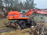 2003 Kobelco E175W wheel excavator side view