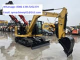 2026 Caterpillar 307 mini excavator, side view