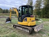 2021 Komatsu PC55MR-5 mini excavator, rear three-quarter view