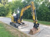 2022 Caterpillar 304-07 mini excavator, side view