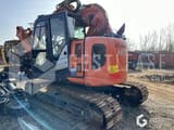 2018 Hitachi ZAXIS 135 US crawler excavator, rear three-quarter view