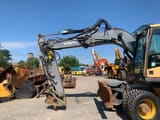 2011 Volvo EW140C wheel excavator side view