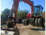 2006 Atlas 1305 wheel excavator, front three-quarter view
