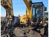 2006 Caterpillar M318CMH wheel excavator front view