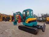 2019 Kubota KX155 mini excavator, rear three-quarter view