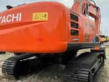 2023 Hitachi ZX210 crawler excavator, rear three-quarter view