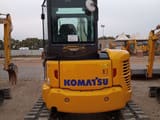 2024 Komatsu PC55MR-5 mini excavator, rear view