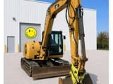 2018 Caterpillar 308E2CR crawler excavator, front three-quarter view