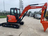 2022 Kubota U55-4 mini excavator, side profile view